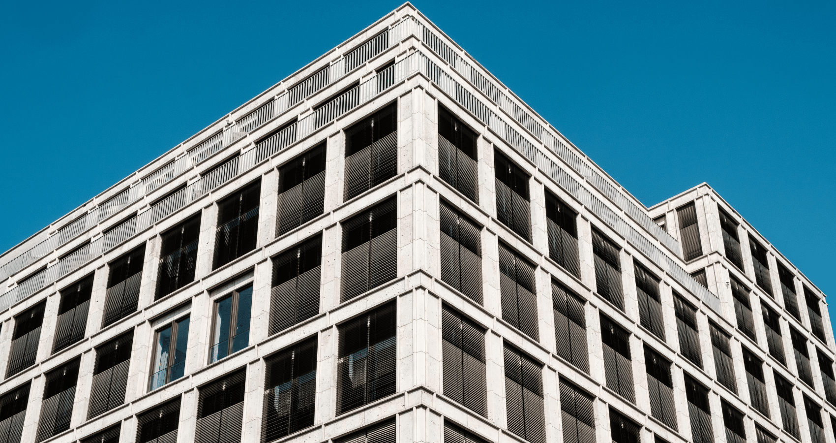 Iconic clock-adorned building symbolizing Private Mortgage Loans' stands tall.